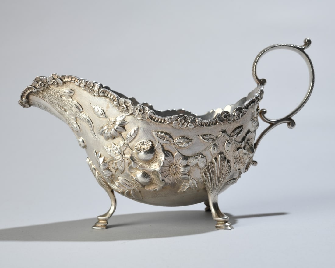 S. Kirk & Son Sterling Silver Sauce Boat: Monogrammed, marked to underside. Approx. 4 1/2" x 8" x 3 3/4". Weight: approx. 10.03 ozt. Our primary recommendation is to arrange shipping yourself using Blue Ridge Pack & Ship. Most bidders find