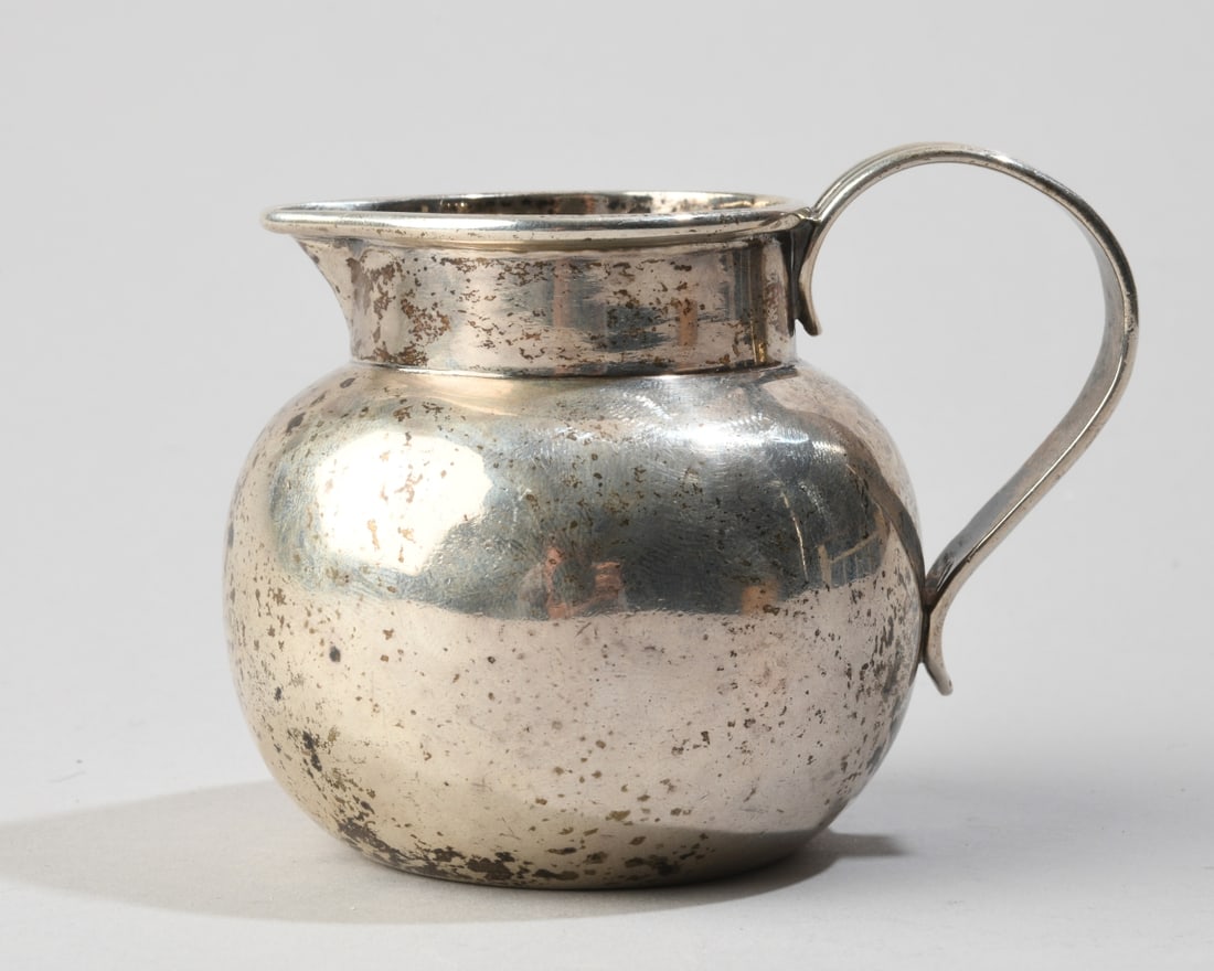 Georgian Sterling Silver Cream Jug: Maker's mark very faded, possibly GG HG (George Gray & Hugh Gordon, London), 1792, no monograms. H: approx. 3". Dia: approx. 2 5/8", approx. 3 1/4" from handle to front. Weight: approx. 4.85 ozt. Our