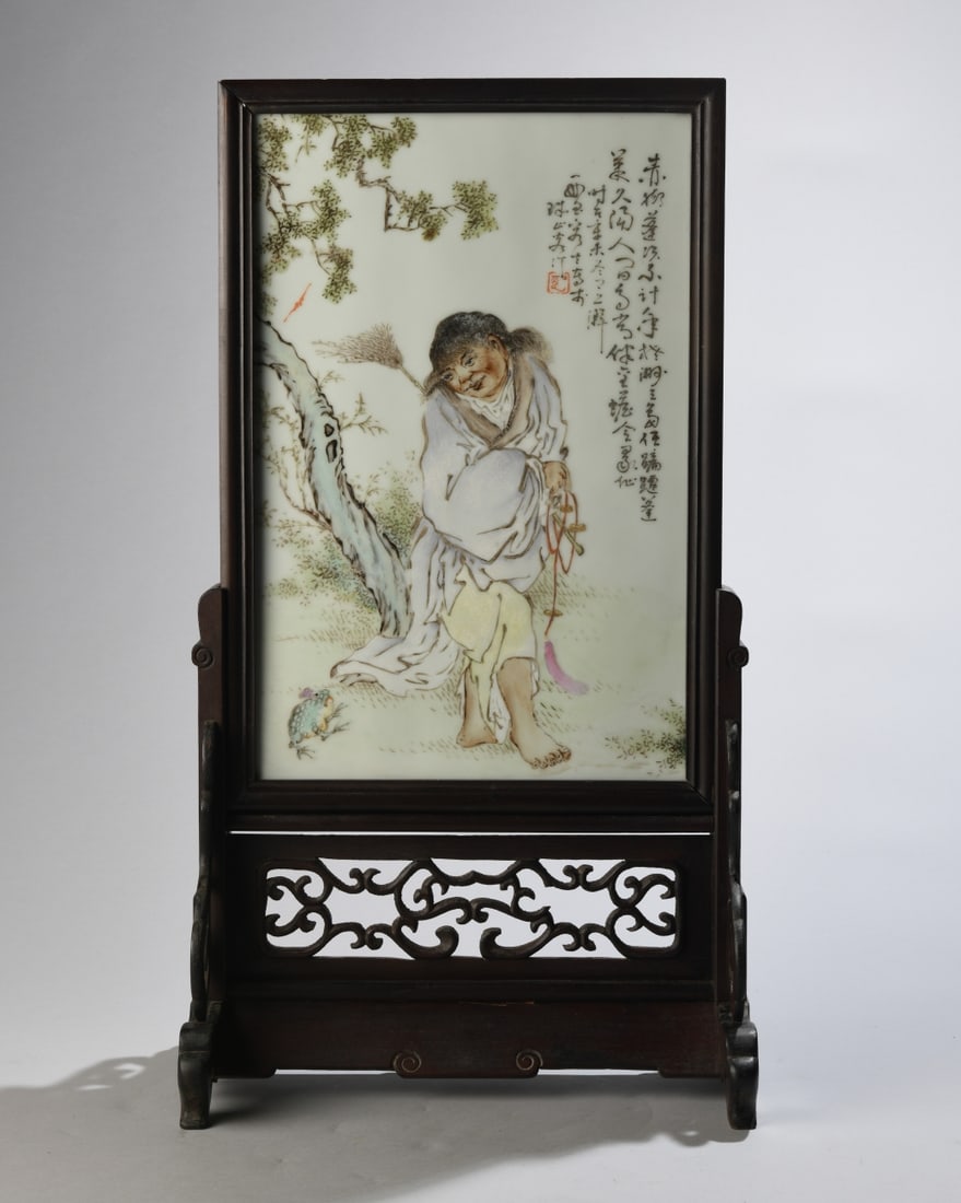 Republic Period Chinese Porcelain Plaque of Liu Ha: Hand painted Chinese porcelain plaque depicting the Daoist immortal Liu Hai seated beneath a tree accompanied by the three-legged money toad, a traditional symbol of wealth and good fortune. Finely