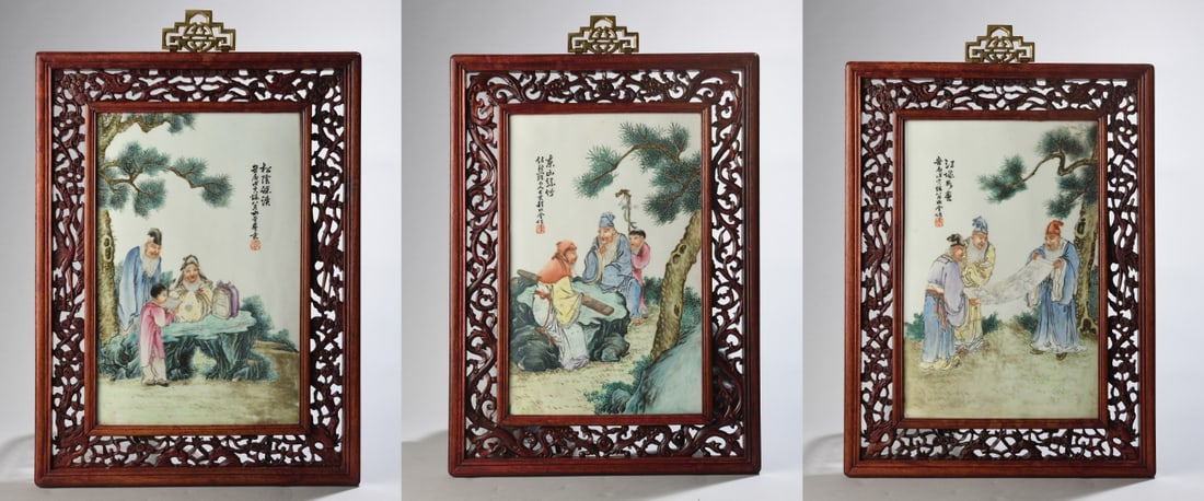 3 Chinese Famille Rose Literati Porcelain Plaques: Set of three Chinese famille rose porcelain plaques depicting scholars engaged in literary and artistic pursuits. Each plaque bears a black enamel inscription and red seal, and is presented in a