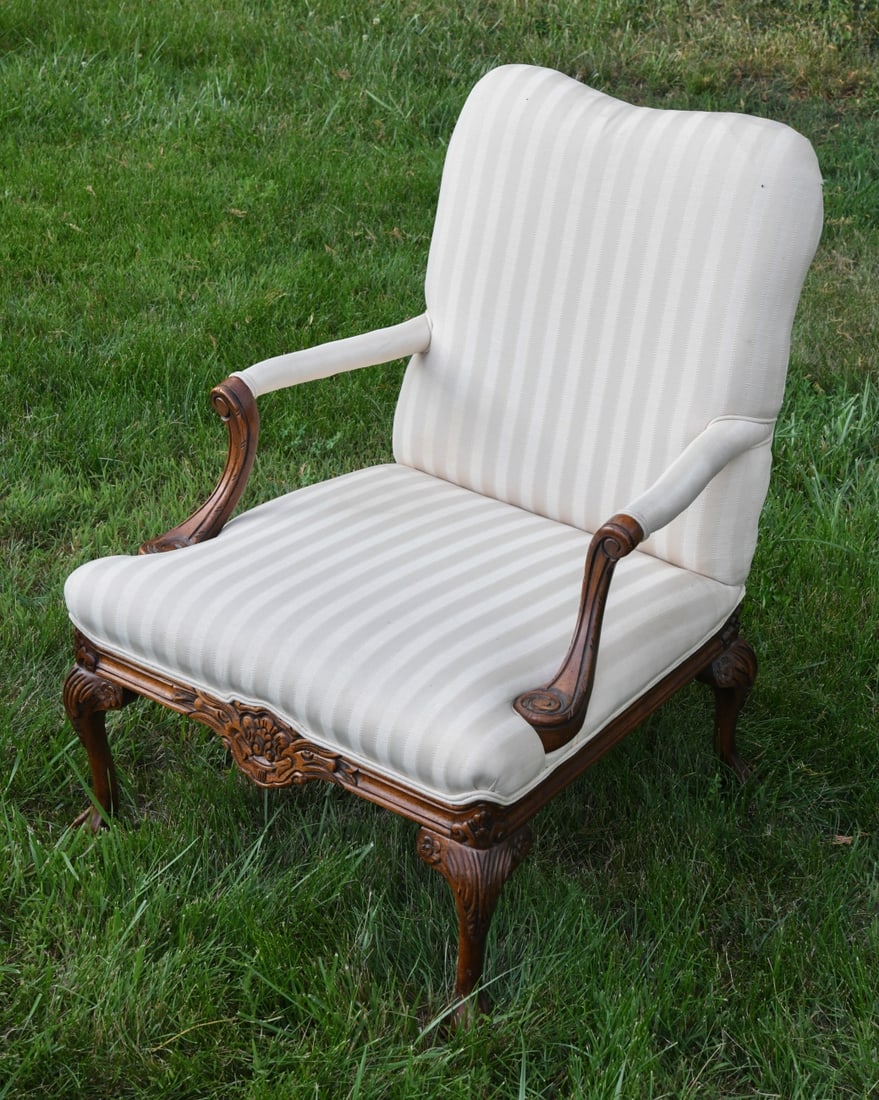 Vintage Chippendale Style Armchair: A 20th century Chippendale style open arm chair featuring cream striped upholstery. Dimensions approx. 37 1/2" H x 23" W x 26" D. Our primary recommendation is to arrange shipping yourself using Blue