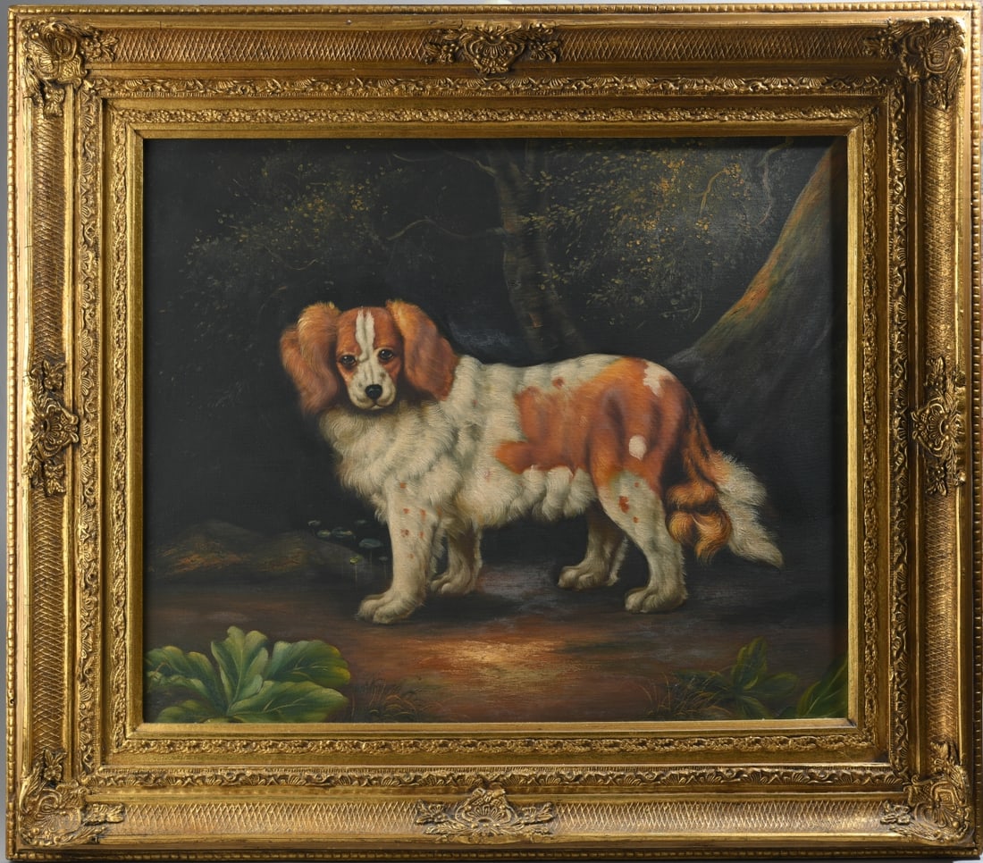 Oil on Canvas Portrait of a Spaniel: A charming oil on canvas portrait depicting a King Charles Spaniel standing in a darkened woodland setting. Frame approx. 32 3/8" x 28 1/2". Sight approx. 23 1/2" x 19 1/2". Our primary