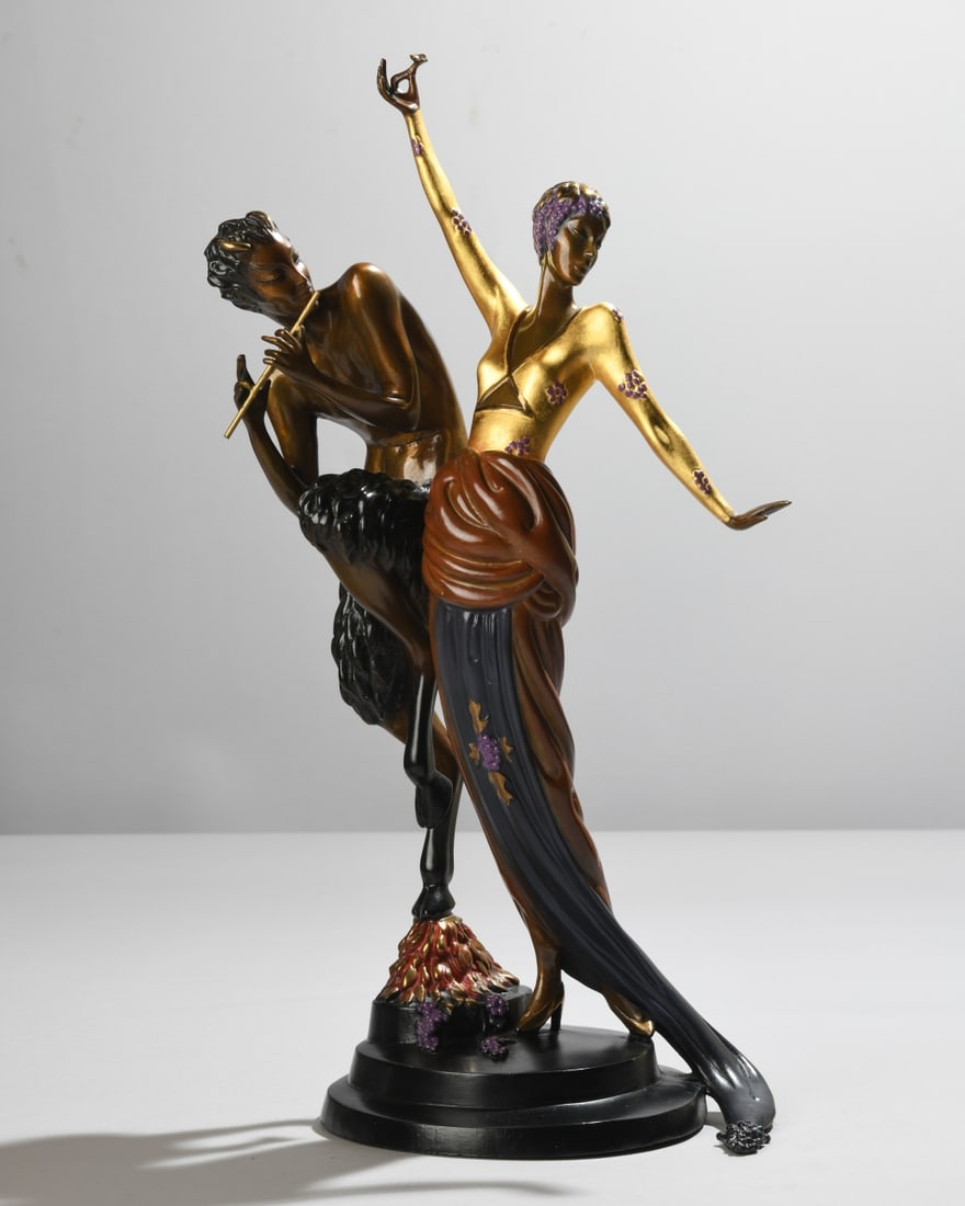 Erte (Romain de Tirtoff, 1892-1990) Woman & Satyr: 1986 patinated bronze figural sculpture from the “Images in Bronze” series, depicting a dancing female figure with gilt and polychrome decoration beside a flute playing satyr, mounted on a