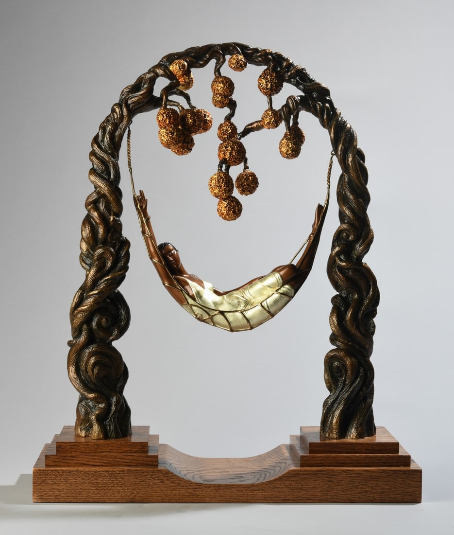 Erte (Romain de Tirtoff, 1892-1990), Spider Web: 1989 patinated bronze figural sculpture from the “Glamour in Bronze” collection, depicting a reclining female figure suspended in a hammock beneath stylized flowering branches within an