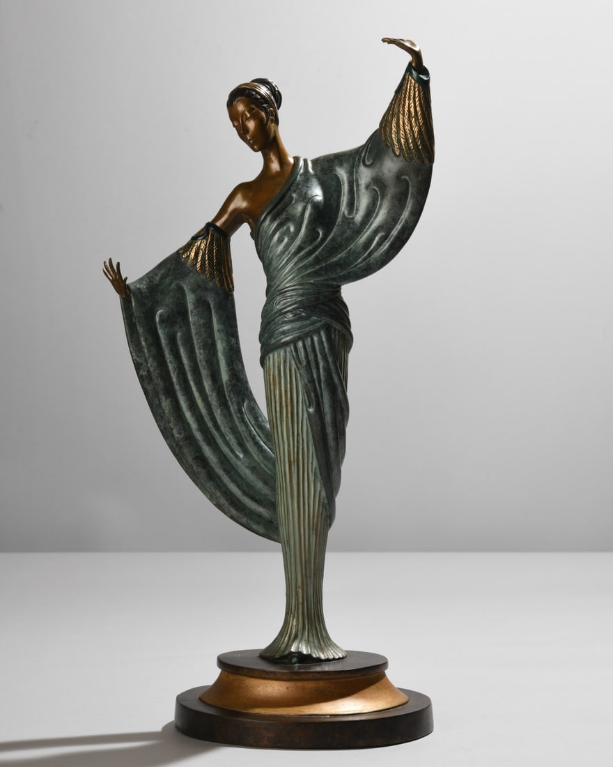Erte (Romain de Tirtoff, 1892-1990) In the Evening: Patinated bronze figural sculpture from the “Images in Bronze” series, depicting a stylized female figure in flowing evening dress with outstretched arms, on circular base. Signed, edition