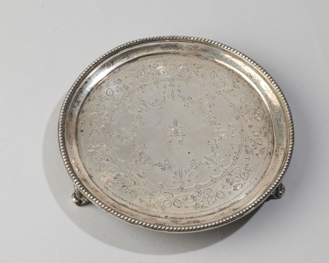 Victorian Sterling Silver Footed Tray: Marked for E. Barnard (London) and dated 1865, monogrammed. Dia: approx. 6", H: approx. 1". Weight: approx. 4.27 ozt. Our primary recommendation is to arrange shipping yourself using Blue Ridge Pack