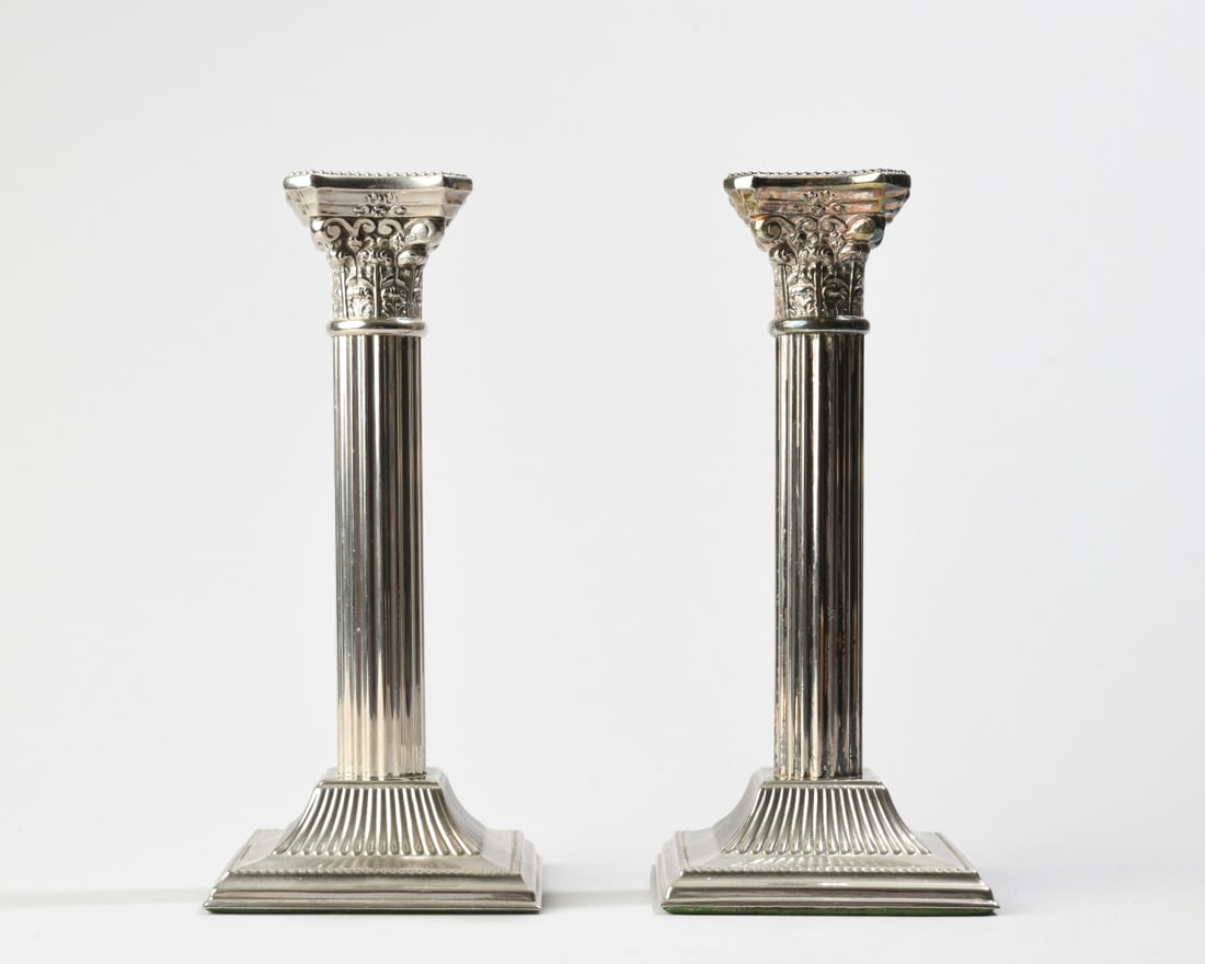 Pair of English Silverplate Candlesticks: H: approx. 8". Base: approx. 3 5/8" x 3 5/8".v Our primary recommendation is to arrange shipping yourself using Blue Ridge Pack & Ship. Most bidders find this is the most economical route. Simply