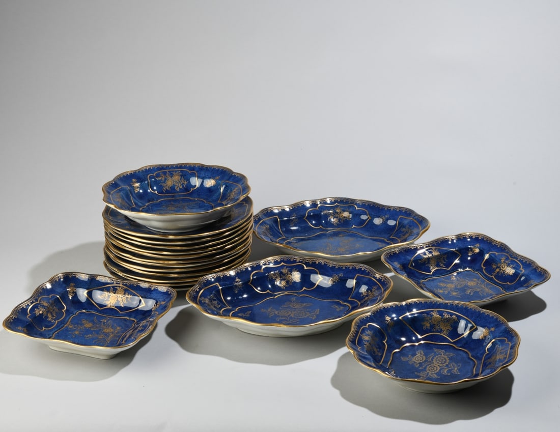 Blue and Gilt Porcelain, 18 Pieces: No maker's marks, no monogram. To include two round bowls (dimensions approx. 8 1/4" dia. x 1 7/8" H, both with minor rim chips, one with hairline), two square bowls (dimensions approx. 8" x 8" x 1