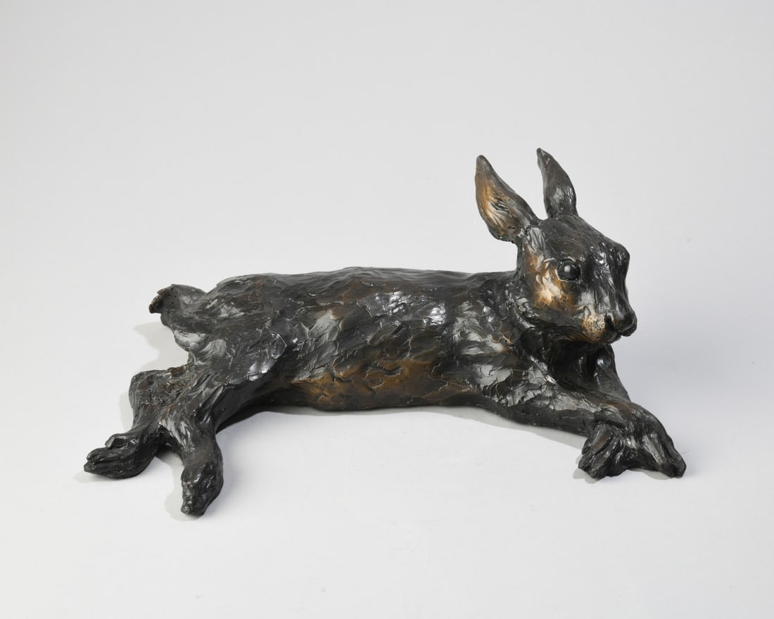 William H. Turner Bronze Rabbit: Patinated bronze resting rabbit. Signed, dated, and numbered - W.H. Turner 25/200 1996. Dimensions approx. 11 1/2" x 4 1/4" x 7". Our primary recommendation is to arrange shipping yourself using Blue 