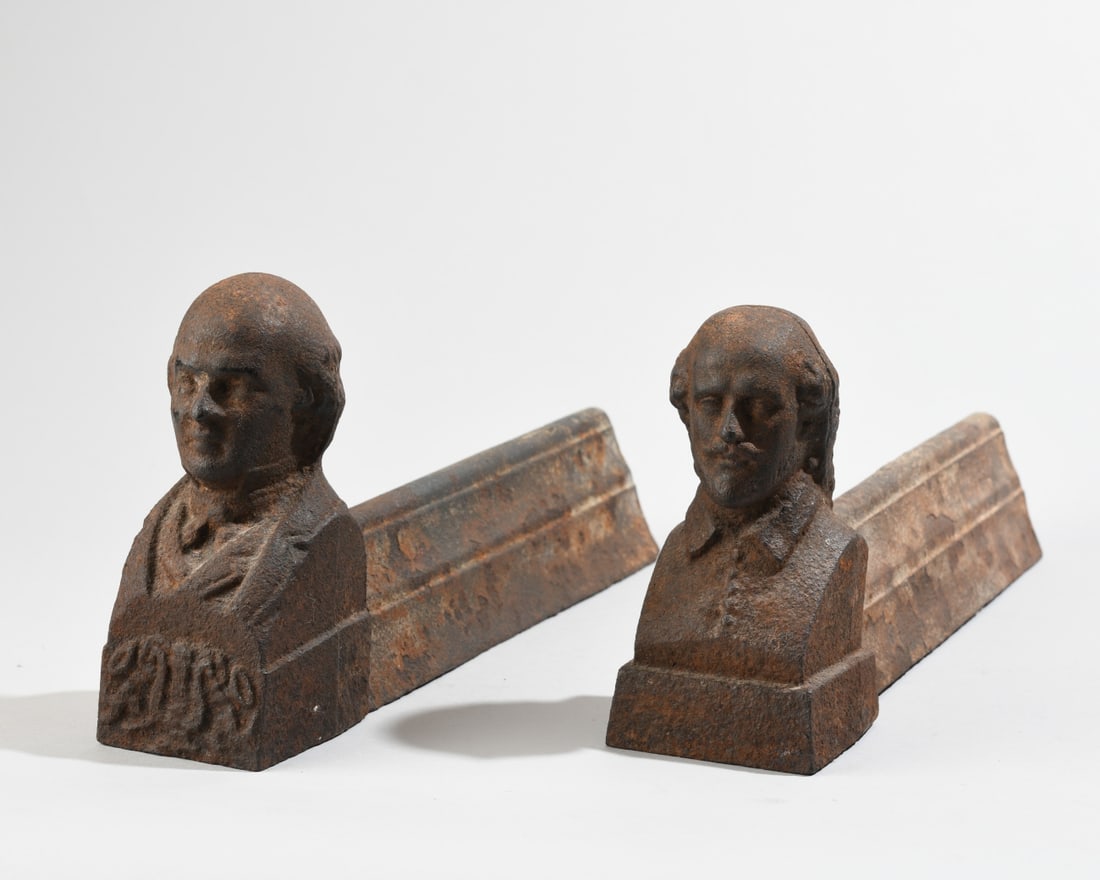 Pair of 19th C. Cast Iron Figural Bust Andirons: Pair of antique American cast iron hearth andirons featuring figural portrait busts. One andiron depicts George Washington, and the matching piece depicts William Shakespeare. Each bust rests on an