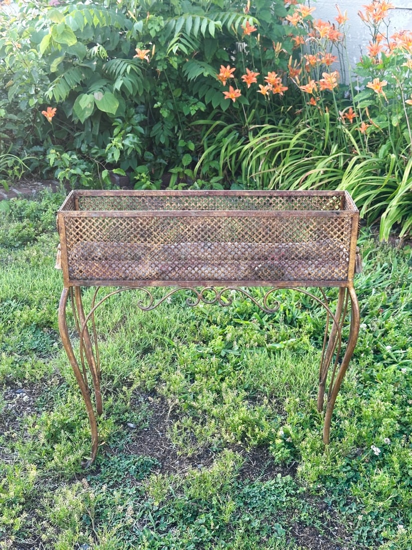 Decorative Cast Metal Planter Stand: With weathered gilt painted finish and wear from outdoor use. 29" x 29 1/4" x 9 1/4". VHC 386 Our primary recommendation is to arrange shipping yourself using Blue Ridge Pack & Ship. Most bidders