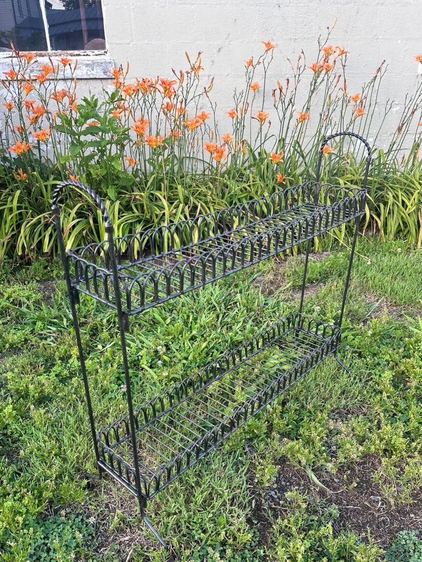 Contemporary Metal Garden Planter Stand: Some wear from outdoor use. Approx. 33 1/2" x 36 3/4" x 13 1/2". VHC 386 Our primary recommendation is to arrange shipping yourself using Blue Ridge Pack & Ship. Most bidders find this is the most