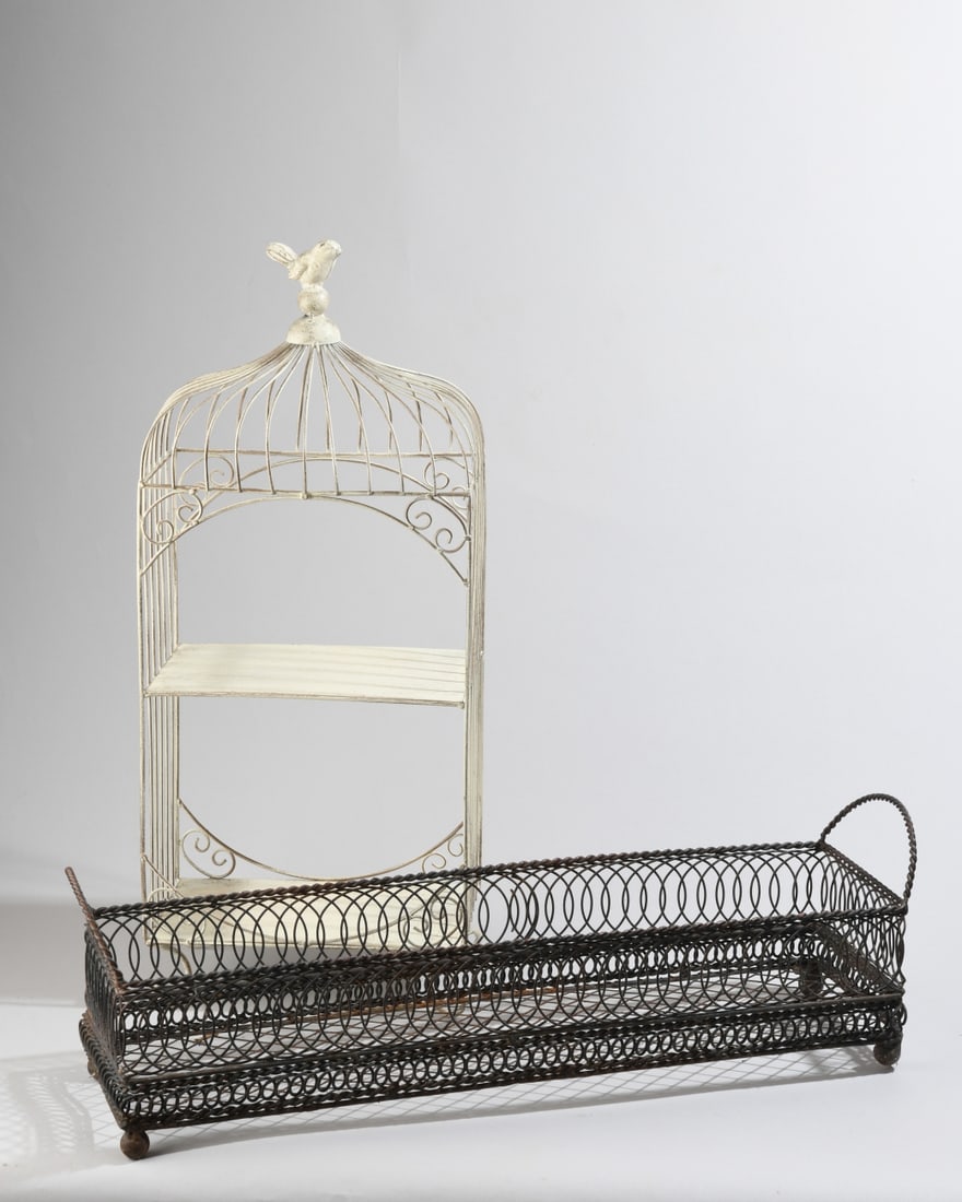 Birdcage Shelf & Wireword Planter Tray Group: White painted metal birdcage-from shelf with bird-form finial, and black painted metal wirework planter tray with twisted wire handles. Minor rust and wear. Birdcage: approx. 23" x 9 3/4" x 5 3/4".