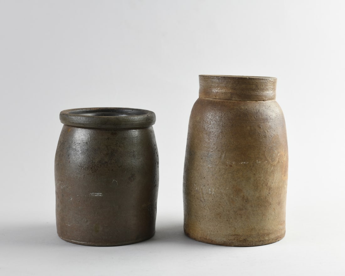 Two 19th C. Stoneware Crock Jars: Two salt-glazed stoneware crock jars, 19th century. No maker's marks, minor rim chips. Largest, H: approx. 8". Dia: approx. 4". Our primary recommendation is to arrange shipping yourself using Blue