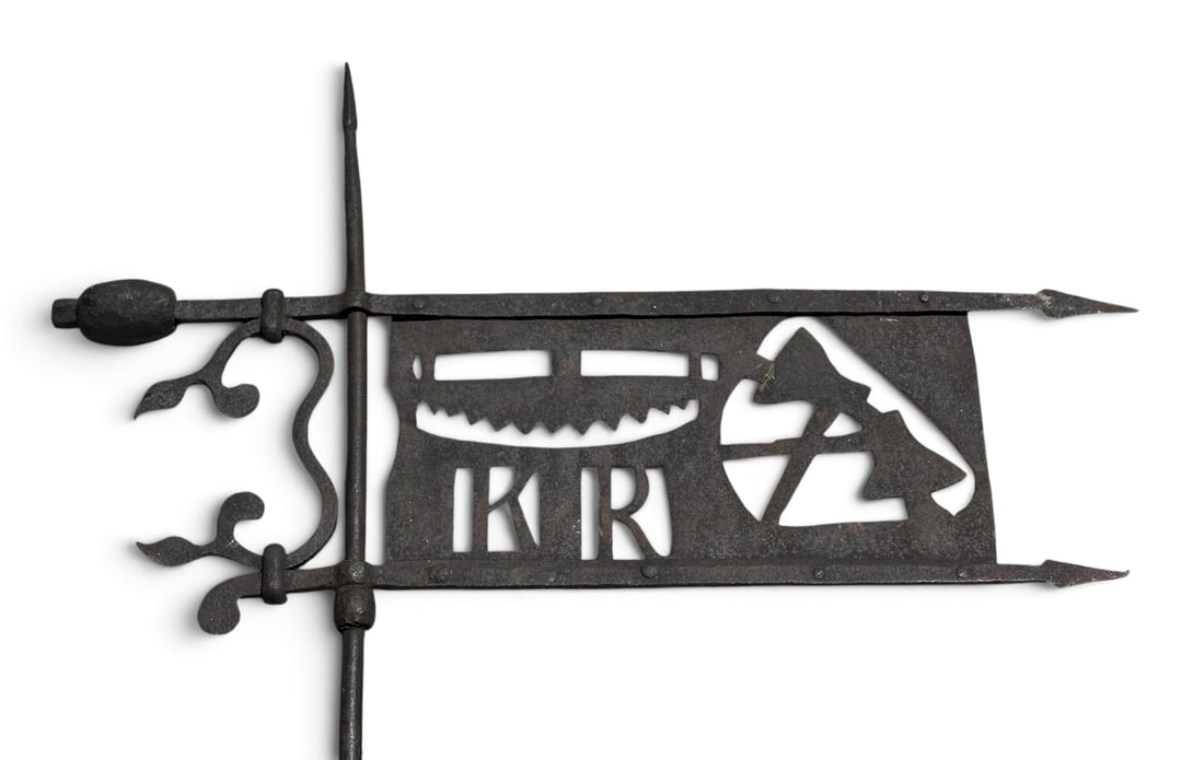 19th C. Wrought Iron Trade Sign Weathervane: 19th century wrought iron pennant form weathervane, cut with the tools of a sawyer or woodworker - a handsaw and crossed axes above the initials 'KR', likely identifying the original trade owner. The