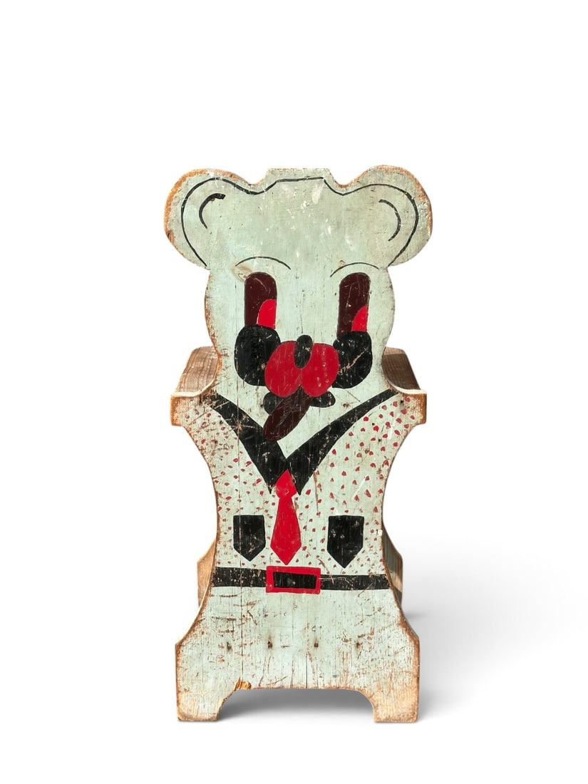 Folk Art Painted Bear Child's Chair: Painted pine child's chair with a backrest cut and painted in the form of a bear dressed in a suit with red tie and belt. Unsigned. In as-found condition. Approx. 24 3/4" x 11" x 11". Provenance: the