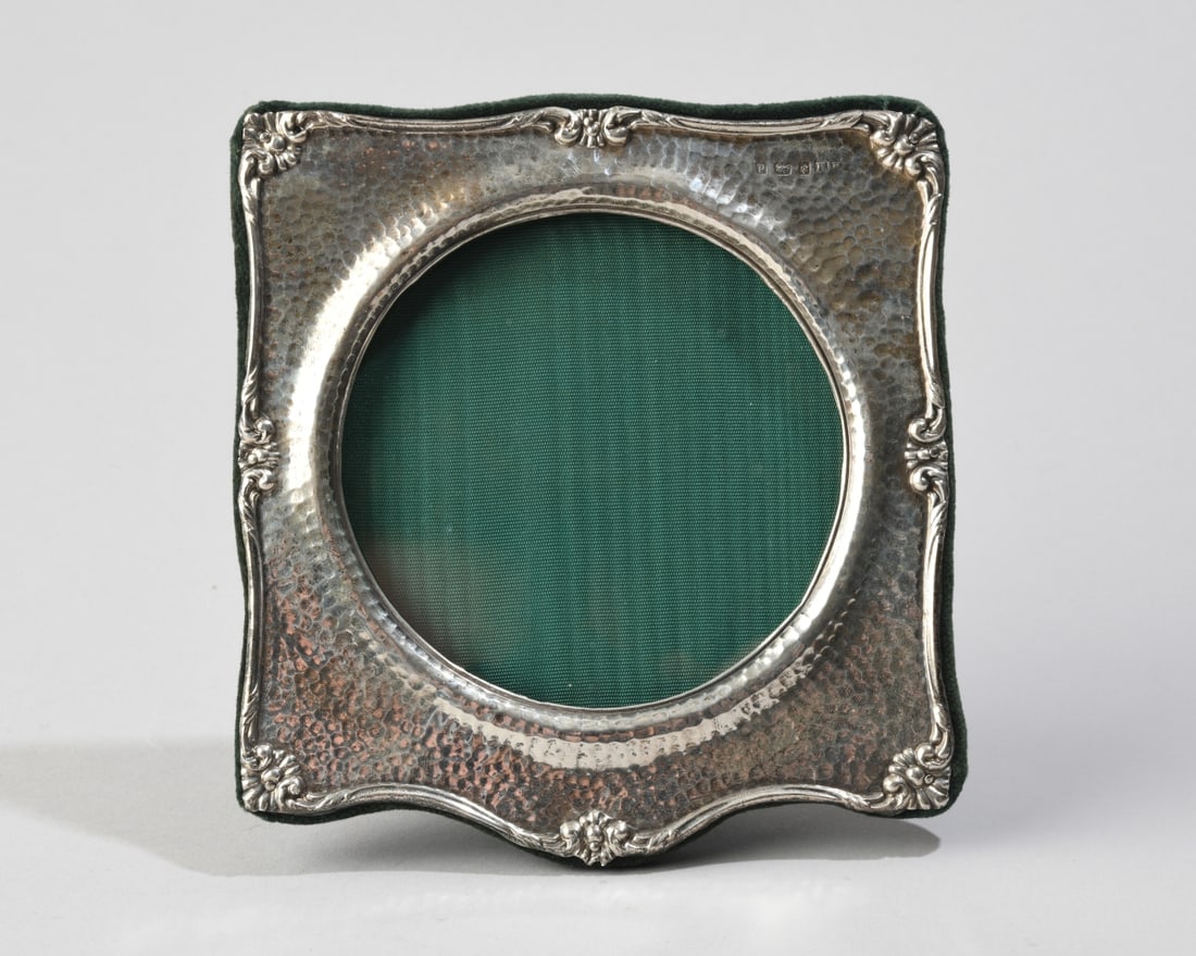 English Sterling Silver Picture Frame: Birmingham maker's mark partially faded (possibly H M), 1903, sterling attached to felt, no monograms. Approx. 5 3/4" x 5 3/8". Our primary recommendation is to arrange shipping yourself using Blue