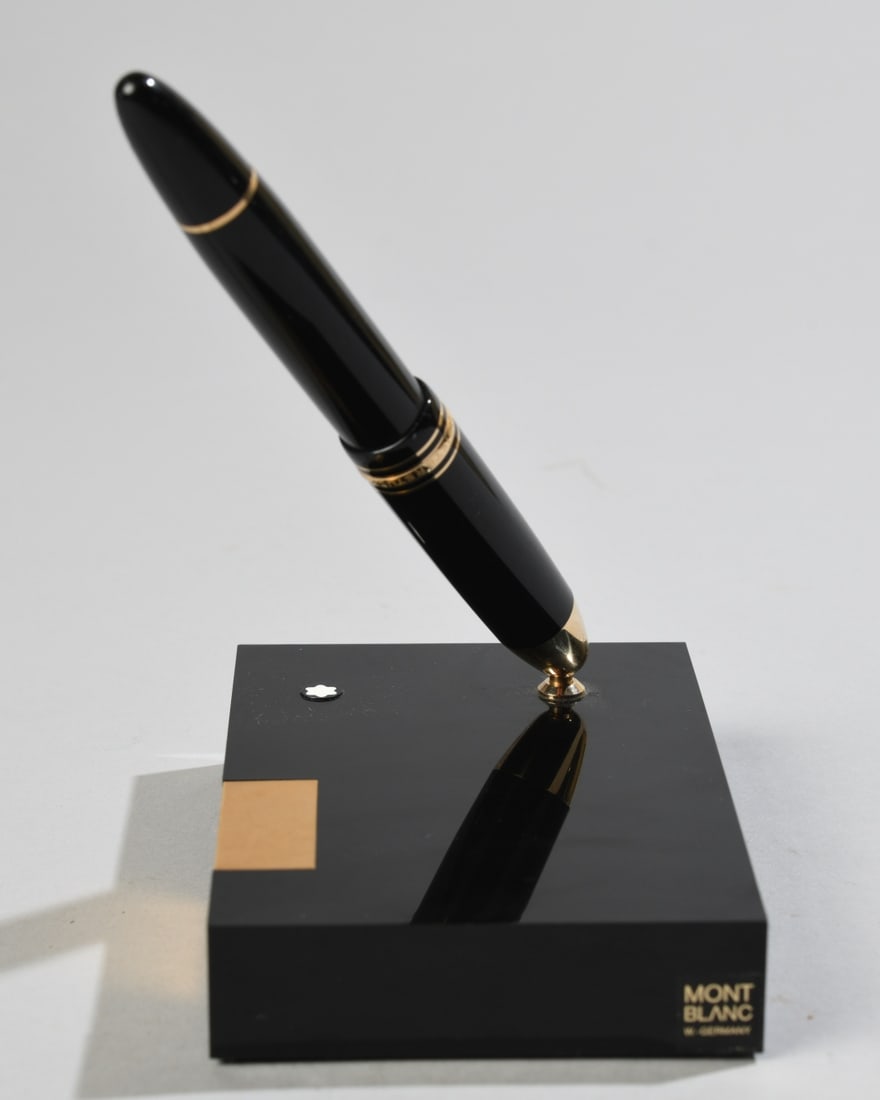 Montblanc Meisterstuck 149 Fountain Pen +: Montblanc desk set featuring a Meisterstuck 149 fountain pen and a heavy black resin base with the iconic snowcap emblem and an unengraved gold-plated plaque. Our primary recommendation is to arrange