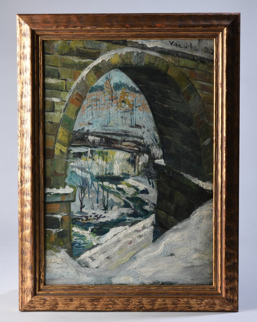 Ludvik Vacatko (Czech, 1873 - 1956): Oil on canvas depicting a winter landscape viewed through a stone arch or bridge, with snow covered banks, water, and distant trees. Signed and dated "Vacatko 33" upper right, framed. Visible image: