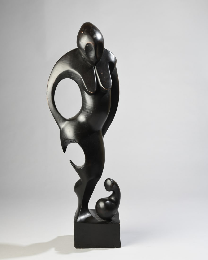 Carved Modernist Abstract Female Figure: Ebonized carved wood sculpture depicting a highly stylized female figure with sweeping openwork forms, mounted on an integral rectangular base. Unsigned, some surface wear with scattered scratches,