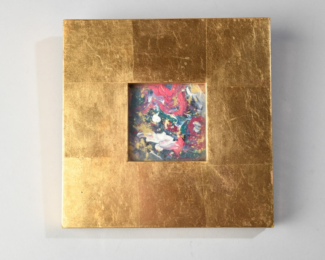 Sandi Ritchie Miller (American, 20th / 21st C.): "Wee Little Space Beauty II", abstract mixed media with artist's label and title notation taped to verso, framed. Visible image: approx. 2 3/8" x 2 3/8". Frame: approx. 6 1/2" x 6 1/2". Our primary re
