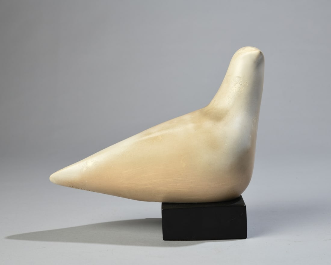 Cleo Hartwig (American, 1907-1988): Plaster dove sculpture by celebrated American artist Cleo Hartwig. Mounted to a black block base, incised C. HARTWIG along the lower body. Dimensions approx. 10 1/4" x 7 3/4" x 4". Our primary recomme