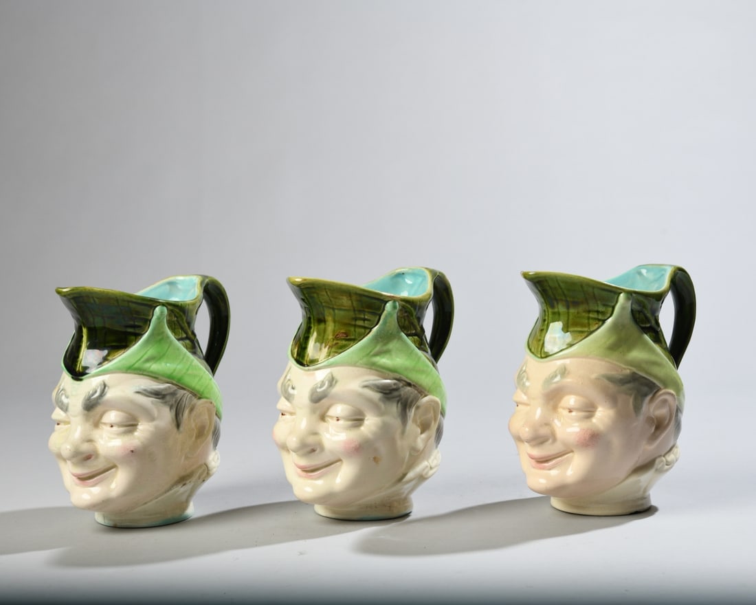 Three Figural Earthenware Pitchers