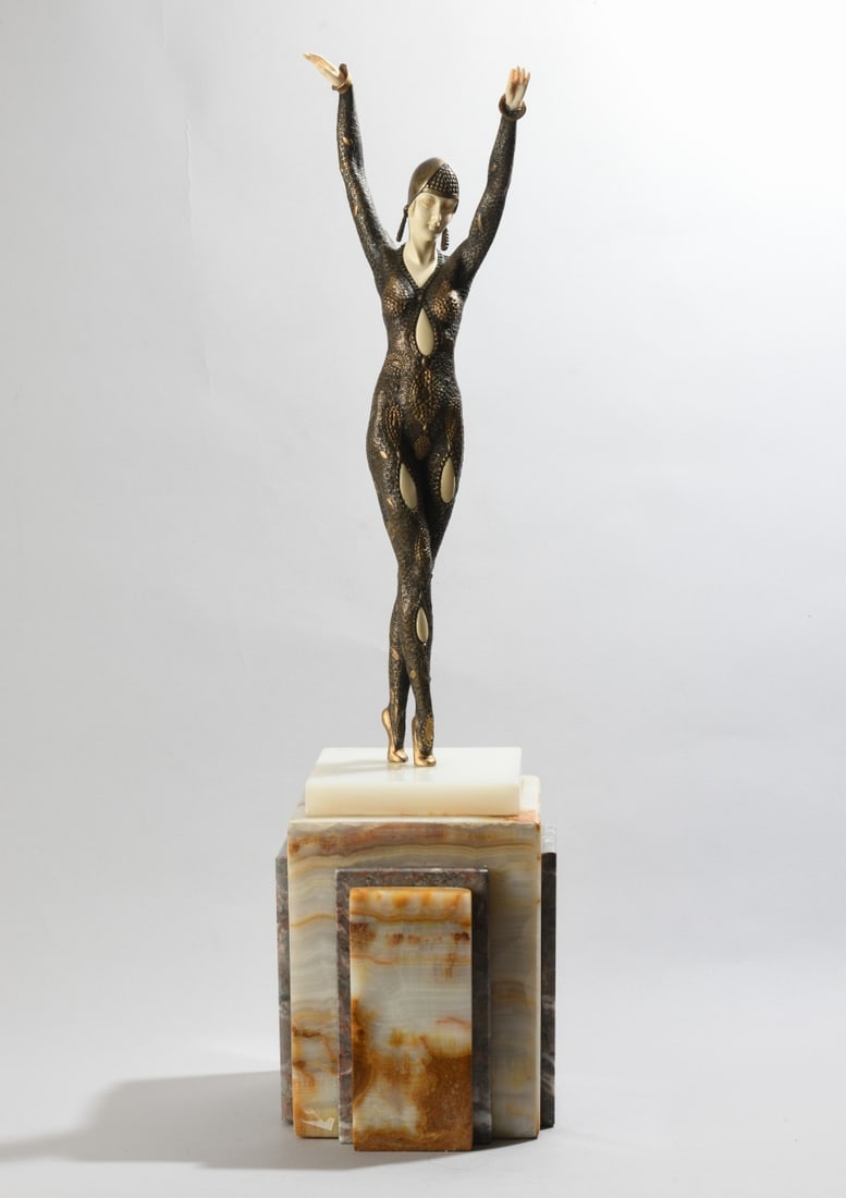 After Demetre Chiparus (1886-1947) Art Deco Dancer: Bronze figure of standing dancer on stepped onyx plinth, arms raised overhead, wearing a patterned bodysuit and snood cap, incised signature "D.H. Chiparus" to top of base, "ETLING PARIS" foundry
