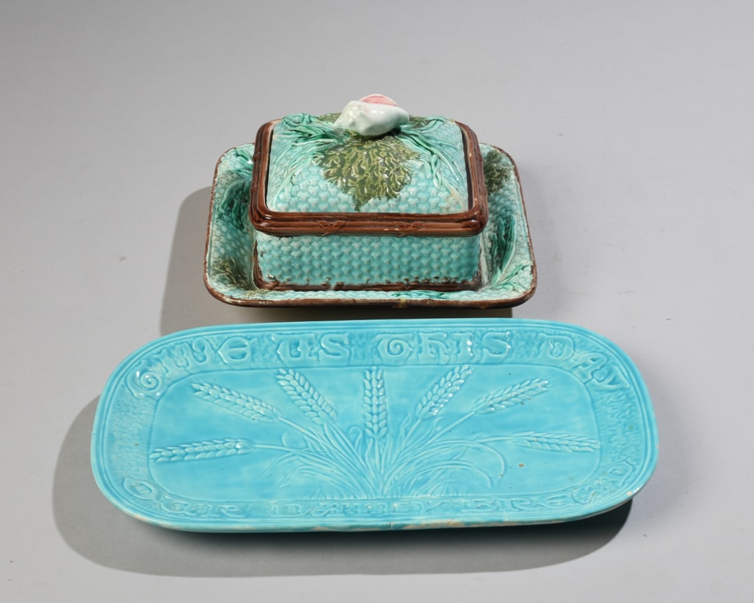 Majolica Covered Dish and Glazed Pottery Platter: Majolica covered dish with attached undertray, marked "H" to underside, lid with conch shell handle and seaweed decoration. All over crazing to inside of dish. Covered dish dimensions: approx. 5 1/2" 