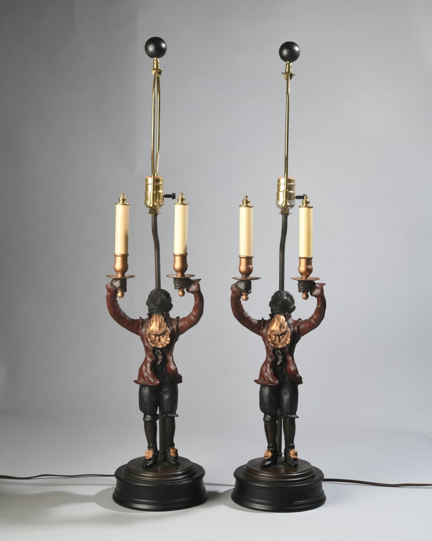 Pair of Figural Monkey Table Lamps: Late 20th/early 21st century, American, both in working condition. Dimensions: approx. 32 1/2" H to top of finial x 8" D x 7" W. Our primary recommendation is to arrange shipping yourself using Blue