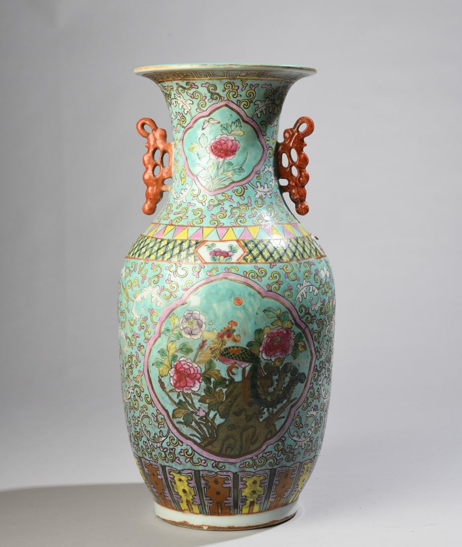 Chinese Famille Rose Vase: Chinese Famille Rose enameled porcelain baluster vase, attributed to the Tongzhi Period (1862-1874) per base label. Features vibrant turquoise ground, floral panels, Phoenix bird motif, and twin