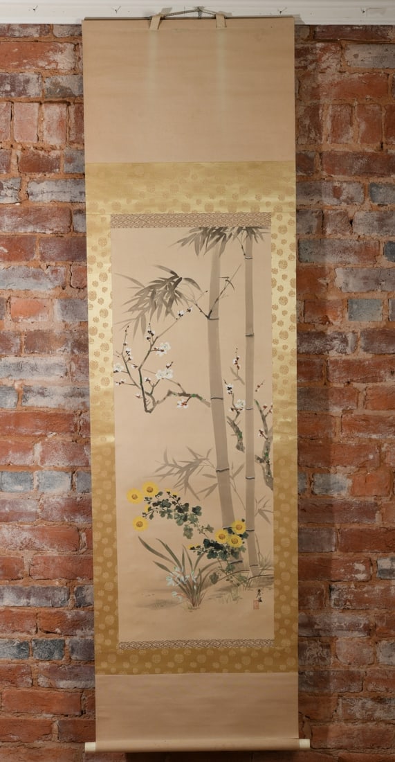 Chinese Floral and Bamboo Hanging Scroll: Showing bamboo, blossoming branches, and chrysanthemums in ink and color, minor damage / discoloration. Mount: approx. 74" x 21". Image: approx. 42" x 15 1/2". Our primary recommendation is to