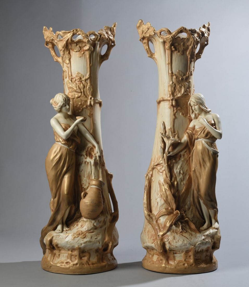 Pair of Monumental Royal Dux Art Nouveau Vases: Pair of early 20th century monumental Royal Dux Art Noueau matte porcelain vases. Designed by sculptor F. Otto, featuring his incised signature near the lower base. Featuring high relief allegorical m