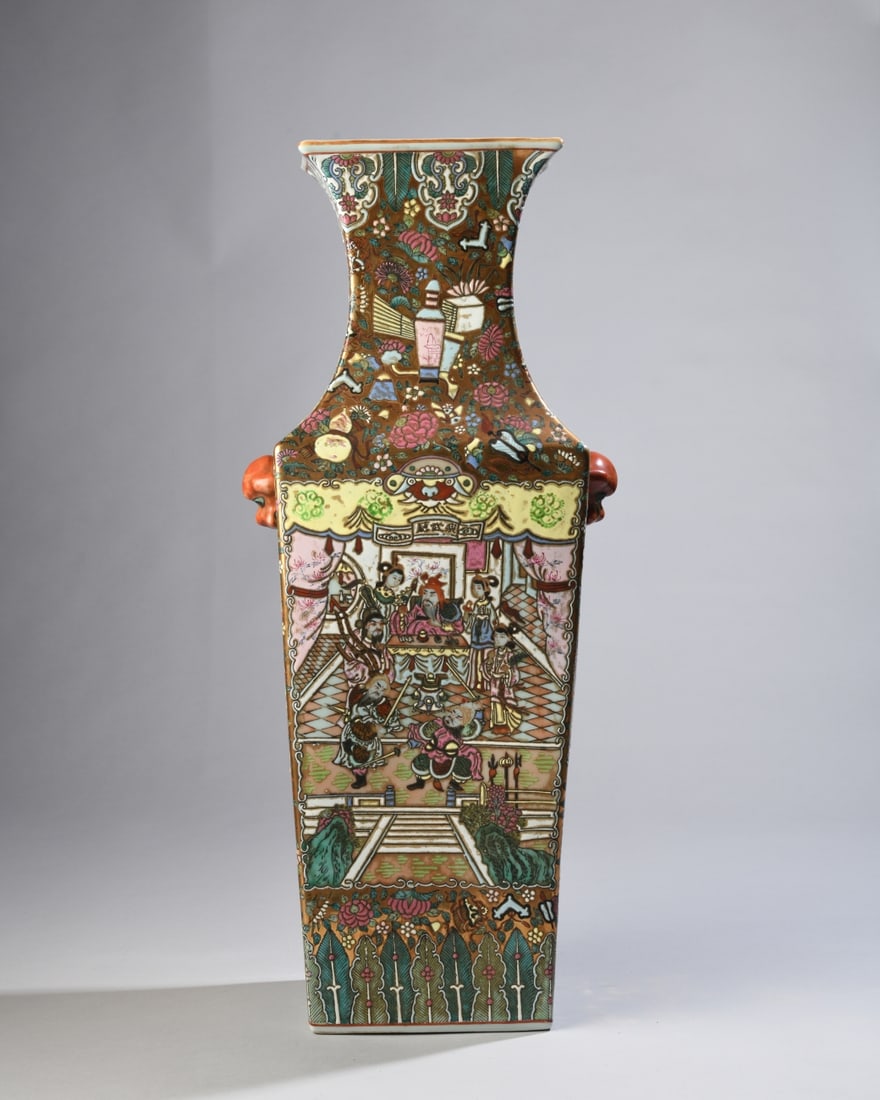 Chinese Famille Rose Square Vase: Chinese Famille Rose molded square porcelain vase featuring court narrative panels set against a dense gilded ground. The base bears an apocryphal six-character Qianlong seal mark in iron-red. Dimensi