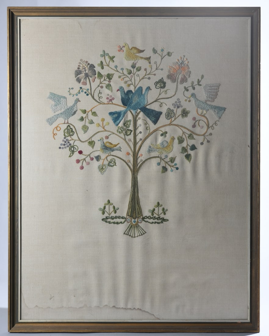 20th Century Tree of Life Crewel Embroidery: Some water staining to the lower portion of the fabric. Dimensions approx. Frame. 36" x 28". Sight. 33 1/2" x 25 1/2". Our primary recommendation is to arrange shipping yourself using Blue Ridge Pack