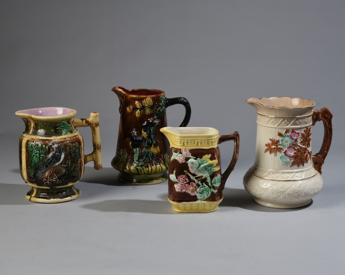 Four English and Continental Majolica Pitchers: Late 19th/early 20th century. Overall crazing and surface wear; some chips and glaze losses. Our primary recommendation is to arrange shipping yourself using Blue Ridge Pack & Ship. Most bidders find