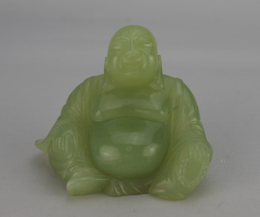 Chinese Carved Green Jade Buddha: Very minor chips on the edge of the back of the robe. H: approx. 3 1/2", W: approx. 4". Our primary recommendation is to arrange shipping yourself using Blue Ridge Pack & Ship. Most bidders find this