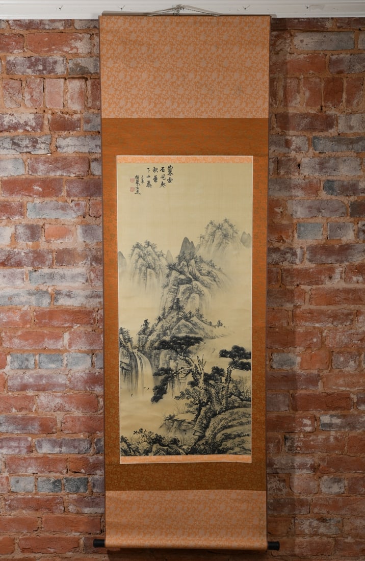 Chinese Landscape Hanging Scroll: Depicting a mountainous landscape with trees, waterfalls, and mist-covered peaks, minor damage / discoloration. Mount: approx. 72" x 22 1/2". Image: approx. 40" x 18". Our primary recommendation is