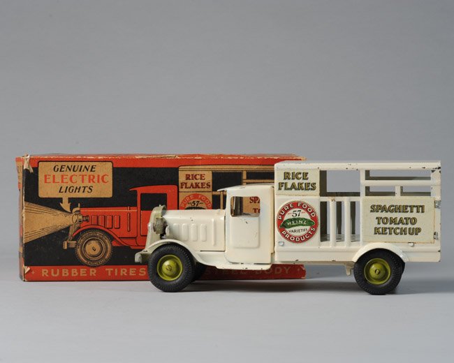 Metalcraft H.J. Heinz Co. Truck & Original Box: All-original pressed steel toy delivery truck and original box by Metalcraft Corp. circa 1930, with Goodrich "Silvertown" rubber tires, real electric lights, original paint and Heinz products decals.