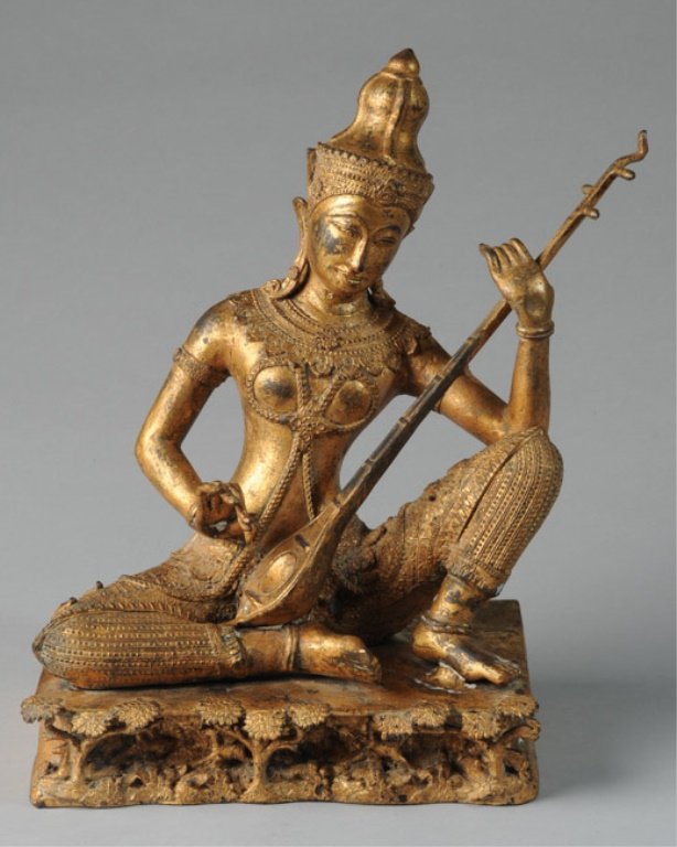 Antique Gilt Rattanakosin Thai Buddha: Playing musical instrument, fine detail. H: approx. 14 1/4". W: approx. 10 1/2". D: approx. 7".
