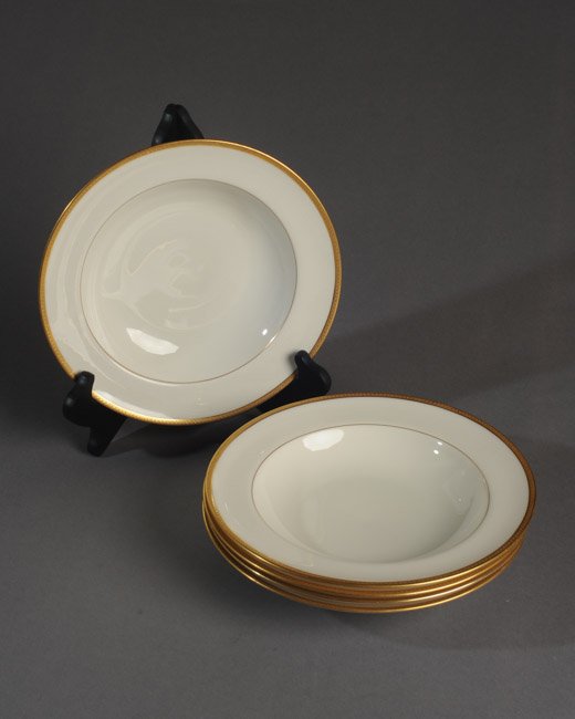 5 Lenox Tiffany & Co. Soup Bowls: Ivory colored with gold textured rims. Marked Lenox, Tiffany & Co., and 8/5.62 to base. No chips, cracks or crazing. Dia: approx. 9".