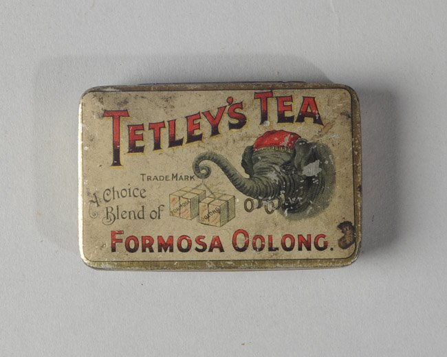 Tetley's Tea Tin: Design with head of elephant, made in England. H: approx. 1/2". W: approx. 3". D: approx 2".