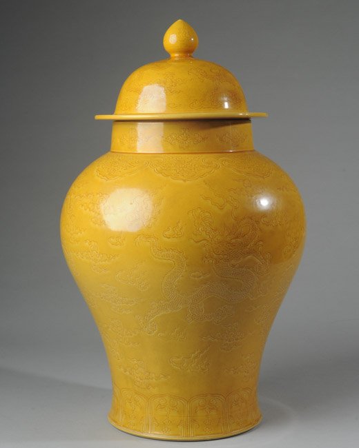 Chinese Monochrome Yellow Glazed Porcelain Vase: Covered, with incised dragon design, 20th century, Yongzheng reign mark to base. H: approx. 19 1/2" (with lid).