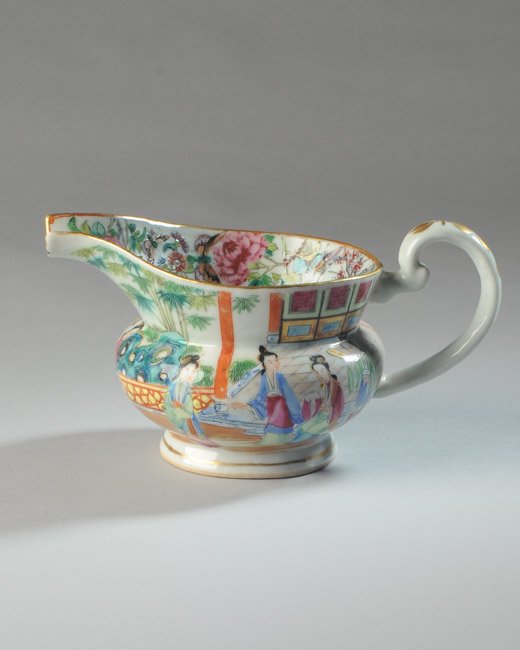 19th C. Chinese Rose Mandarin Creamer: Domestic scene to exterior with bird / butterfly / floral motif to interior rim, unmarked. H: approx. 3 1/2".