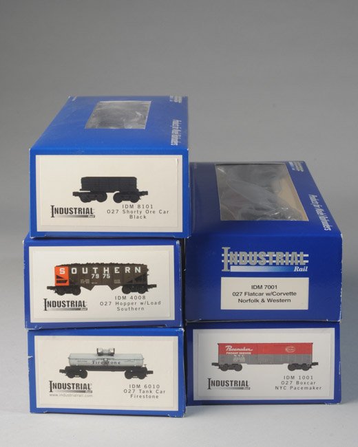 Lot of 5 Industrial Rail Cars O27 Scale: In original boxes, to include IDM 1001 NYC Pacemaker boxcar, IDM 7001 Norfolk & Western flatcar with Corvette, IDM 6010 Firestone tank car, IDM 4008 Southern hopper with load, IDM Black shorty ore car