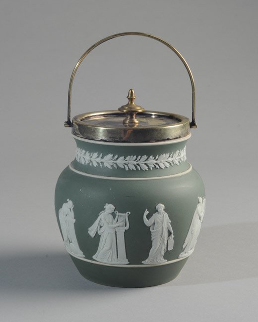 Wedgwood Jasperware Biscuit Jar: Classical figures on green ground, silverplate lid and trim, marked to base. H: approx. 6 1/2" (handle down).