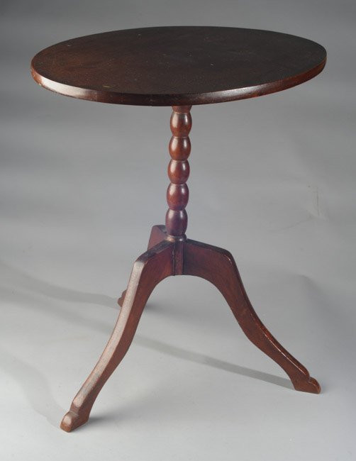 19th C. Tilt Top Tea Table: Three legs with metal spider supports, turned center column. H: approx. 25 1/2". W: approx. 24". D: approx. 18".