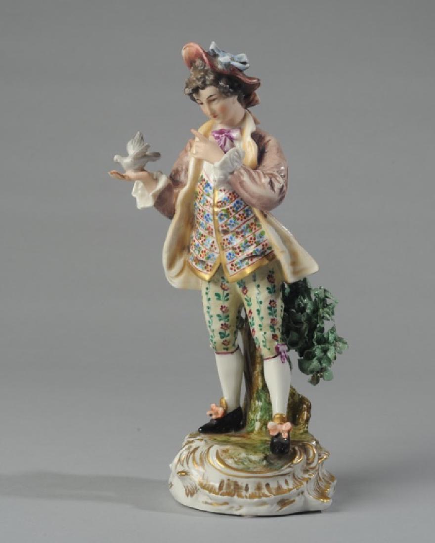 German Porcelain Figure "Boy with Dove": Marks to base indicating it was made in Frankenthal, Germany, 20th C. H: approx. 10". A1478