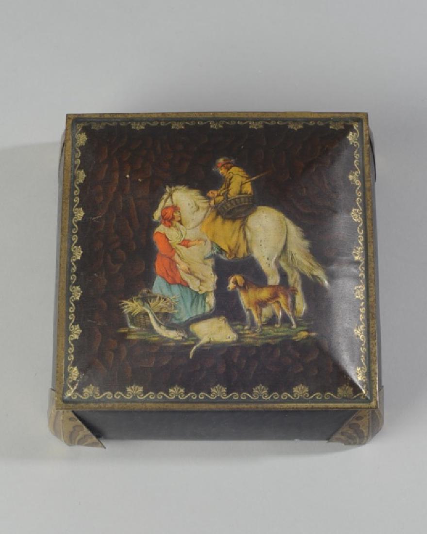 William Crawford & Sons Biscuit Tin: Lid with horse and rider, maiden and dog. H: approx. 2 3/4". W: approx. 7 1/2". D: approx. 7 1/2". A0299