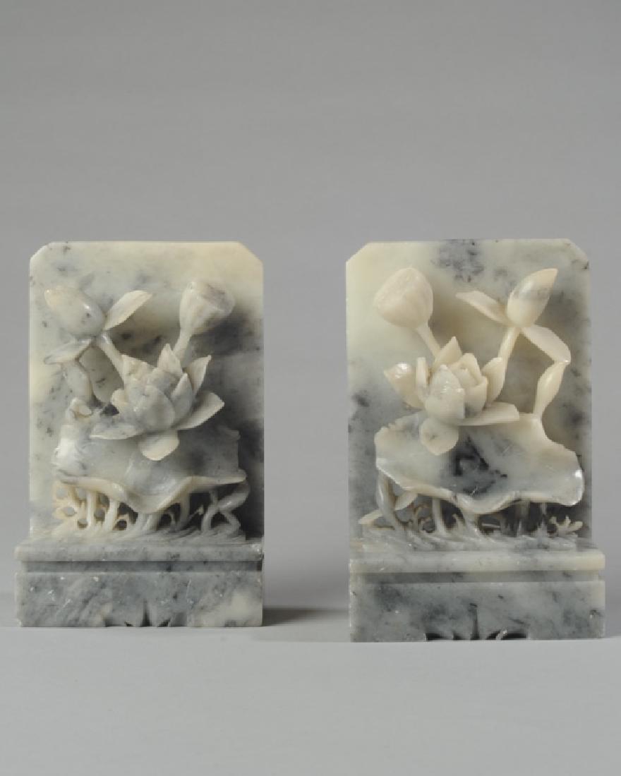 Pair of Alabaster Book Ends: Deeply carved floral elements. H: approx. 7". A0833